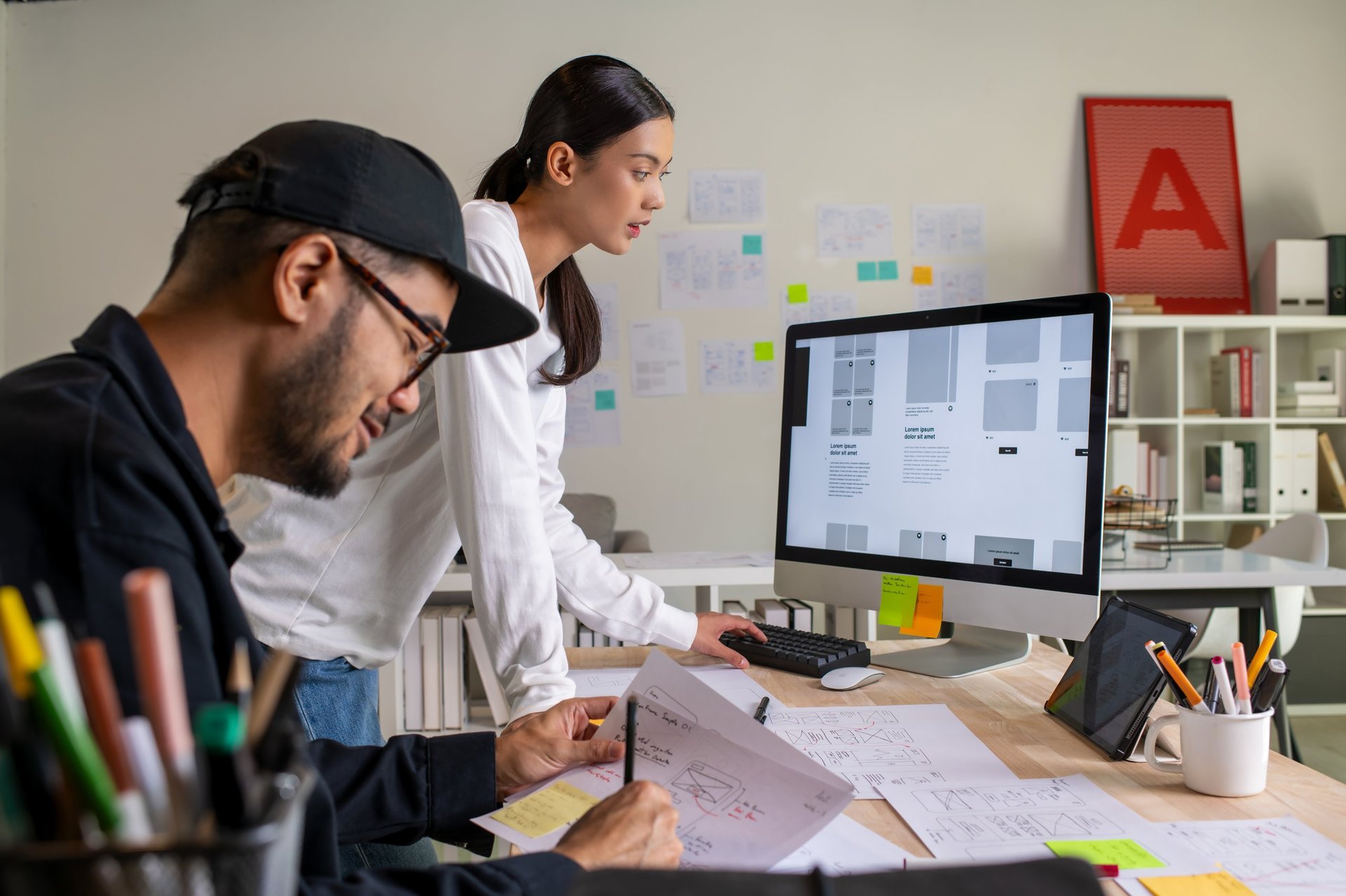 Web design professionals working on website